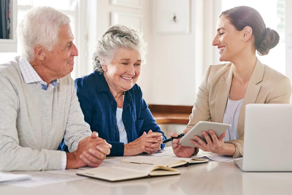 Senior couple meeting with accountant to discuss financial security concerns